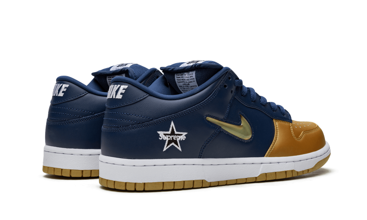 SB Dunk Low "Supreme - Jewel Swoosh Dorado/Azul Marino"