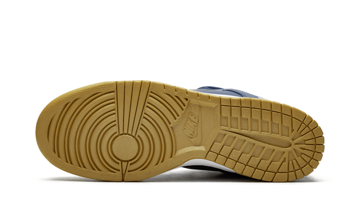 SB Dunk Low "Supreme - Jewel Swoosh Dorado/Azul Marino"