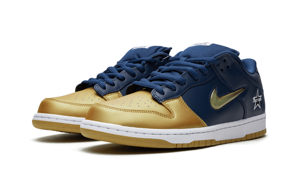 SB Dunk Low "Supreme - Jewel Swoosh Dorado/Azul Marino"